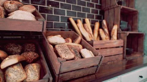 Fresh bread on shelves in bakery Stockillustratie