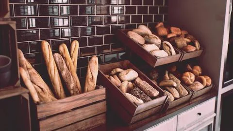 Fresh bread on shelves in bakery 스톡 일러스트