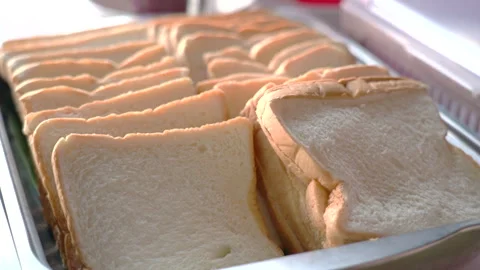 Fresh Bread Slices Arranged for Breakfast Ready to Eat Morning Meal Stock Footage 314943054