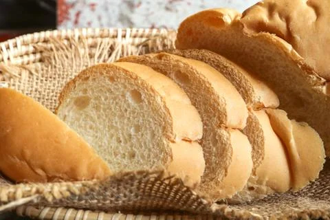 Fresh bread slide on basket. Stock Photos