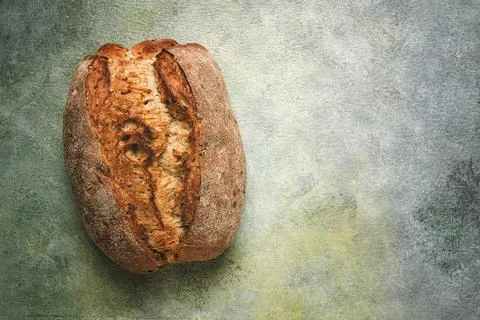 Fresh bread, sourdough, oval shape, top view, rustic style Stock Photos