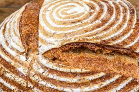 Fresh bread with spelled flour on a table Stock Photos
