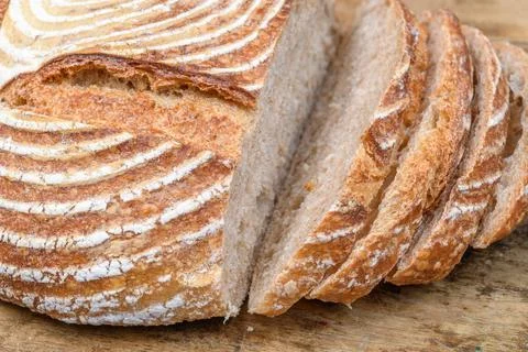 Fresh bread with spelled flour on a table Stock Photos