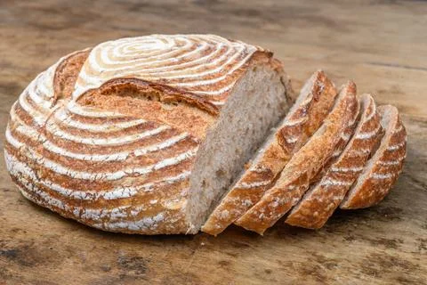 Fresh bread with spelled flour on a table Foto stock