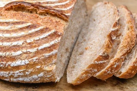 Fresh bread with spelled flour on a table Stock Photos
