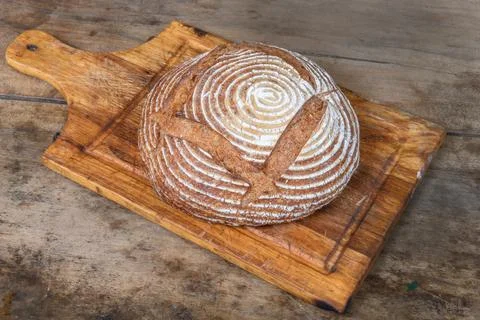 Fresh bread with spelled flour on a table Foto stock
