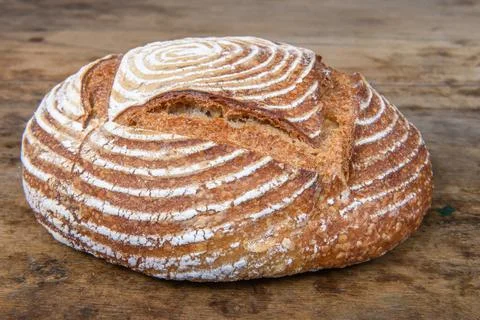 Fresh bread with spelled flour on a table Foto stock