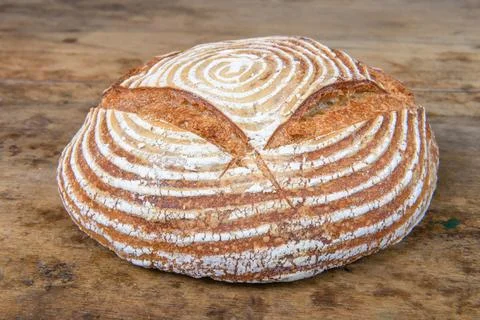 Fresh bread with spelled flour on a table Foto stock