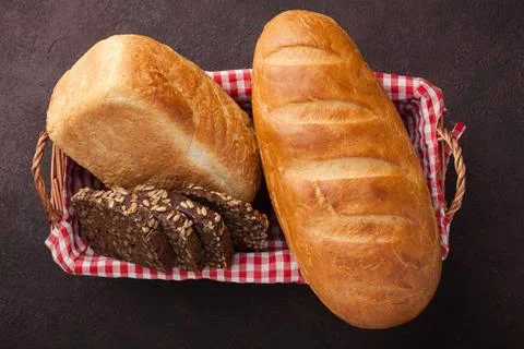 Fresh bread on stone table. Top view Stock Photos