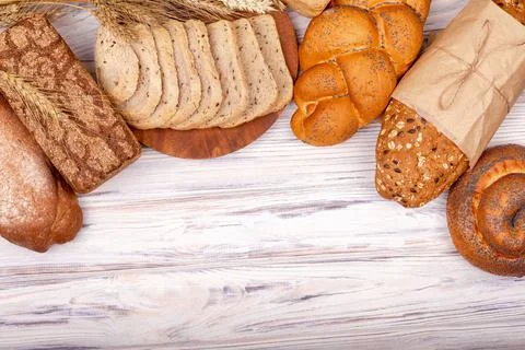 Fresh bread on table close-up. Fresh bread on the kitchen table. Stock-Fotos