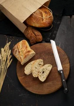Fresh bread on table close-up. Fresh bread on the kitchen table Whole grain b Stock Photos