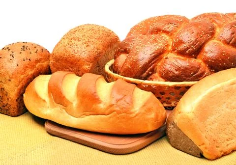 Fresh bread on the tablecloth Stock Photos