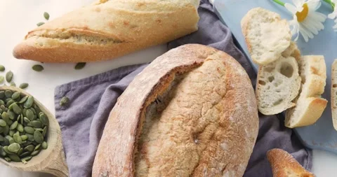 Fresh bread. Top view, rotation Stock Footage 132637492