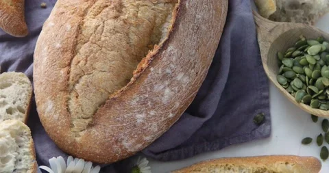 Fresh bread. Top view, rotation Stock Footage 132637493