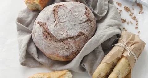 Fresh bread. Top view, rotation Stock Footage 132638004