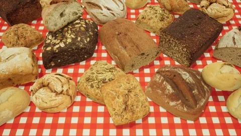 Fresh bread with wheat and gluten on a wooden table.Gluten.Healthy food. Stock Footage 130945242