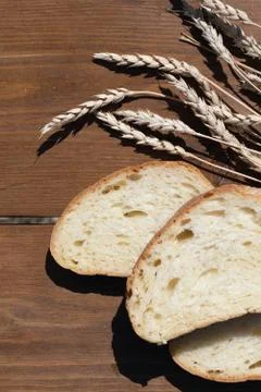 Fresh bread with wheat ears, top view Stock Photos