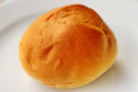 Fresh Bread On The White Plate Stock Photos