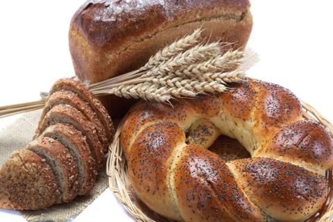 Fresh breads isolated on white background. Stock Photos