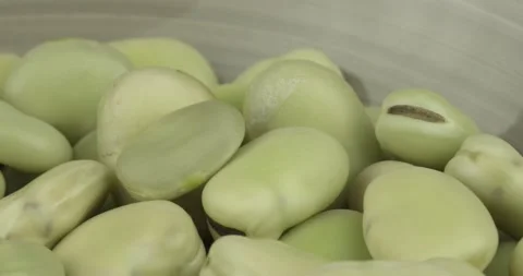 Fresh broad beans closeup rotating loopable Stock Footage 139864916