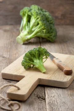 Fresh broccoli on a cutting board Stock Photos