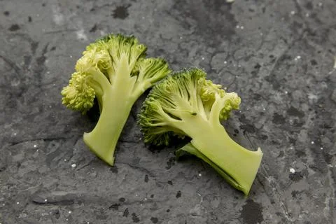 Fresh broccoli on a dark background close-up. View from above Stock Photos