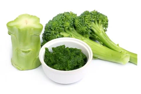Fresh broccoli with ground paste Stock Photos