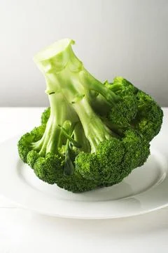 Fresh broccoli on a plate close up Stock Photos