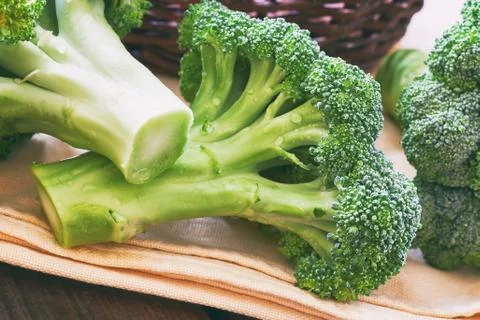 Fresh broccoli on table Stock Photos