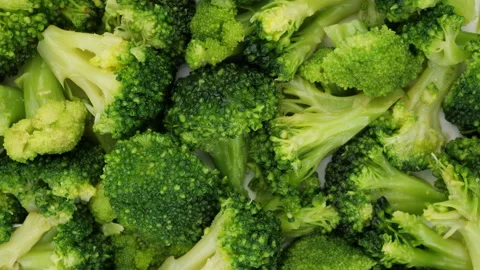 Fresh broccoli top view, rotation. Chopped broccoli Stock Footage 219250414