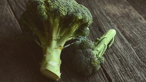 Fresh broccoli on the wooden table Stock Footage 74662961