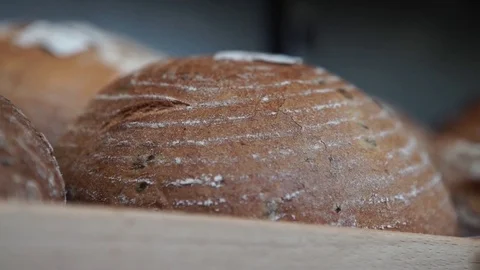 Fresh brown bread Stock Footage 79075463