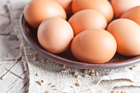 Fresh brown eggs Stock Photos