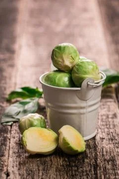 Fresh brussel sprouts over rustic wooden texture.healthy food Stock Photos