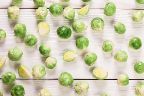 Fresh brussel sprouts over rustic wooden texture.healthy food Stock Photos