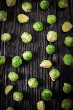 Fresh brussel sprouts over rustic wooden texture.healthy food Stock Photos