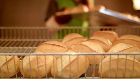 Fresh buns and bread baked in bakery Video stock 99402010