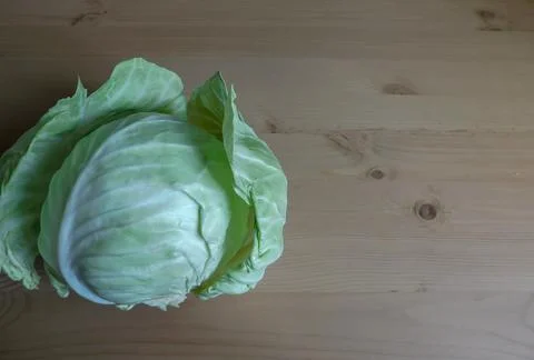 Fresh Cabbage on a wooden rustic table. Copy space. Healthy food. Raw Vegetab Foto stock