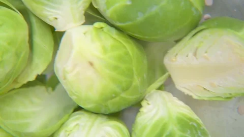 Fresh cabbages in colander Stock Footage 76100150