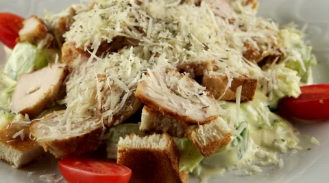 Fresh Caesar salad with grilled chicken, loop Stock Footage 61710496
