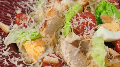 Fresh Caesar salad with parmesan cheese, close-up view, loop Stock-Footage 91032177
