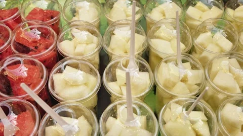 Fresh cantaloupe melon fruit in plastic cups Moscow Stock Footage 323401416