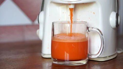 Fresh carrot juice Stock Footage 62601771