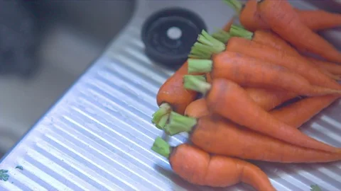 Fresh carrot kept in kitchen Stock Footage 76137033