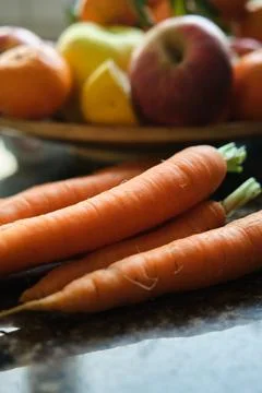 Fresh carrots on the kitchen table 스톡 사진