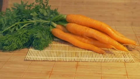 Fresh Carrots on the Table Stock Footage 74160343