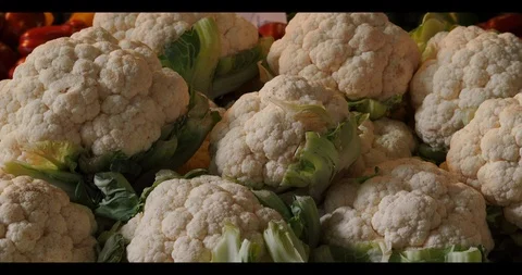 Fresh Cauliflower at Food and Farmers Market - Hand held pan up shot Stock Footage