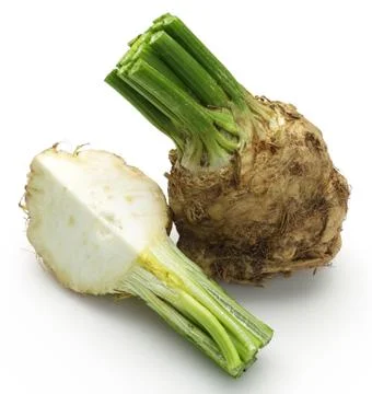 Fresh celeriac root with slice isolated Stock Photos
