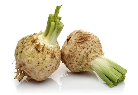 Fresh celeriac on white background Stock Photos