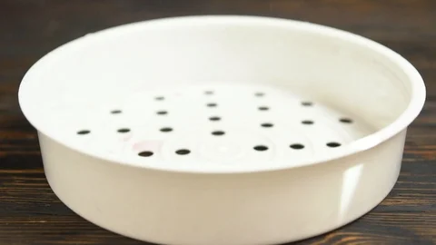 Fresh cherries and water bouncing in a colander Video stock 94053411